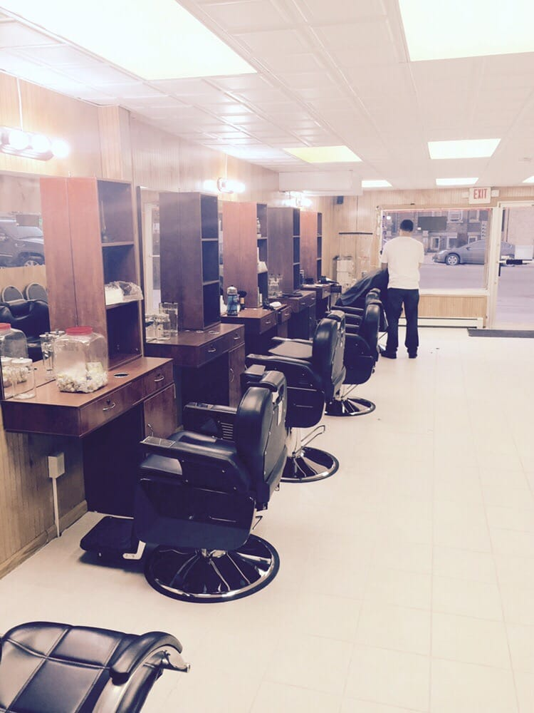 Row of barber chairs inside The Republic